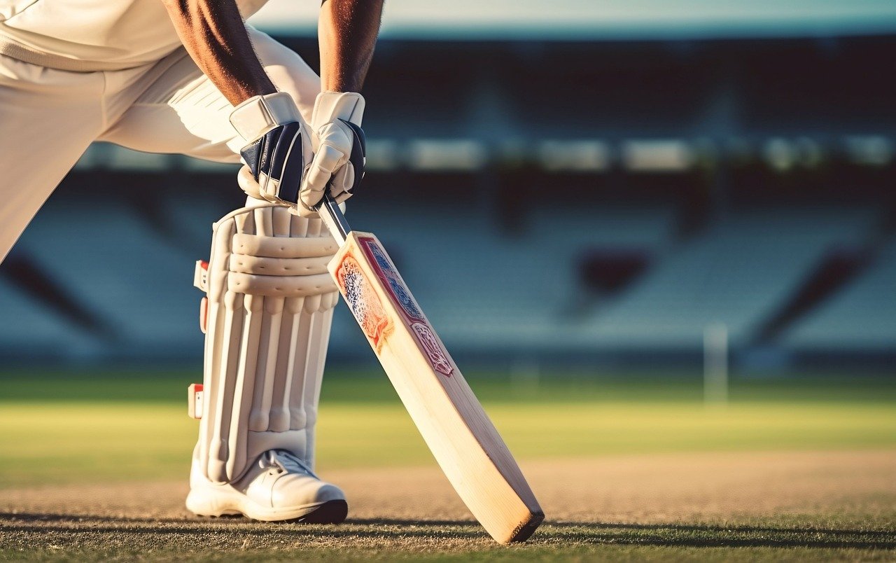 A batsman getting ready at the crease