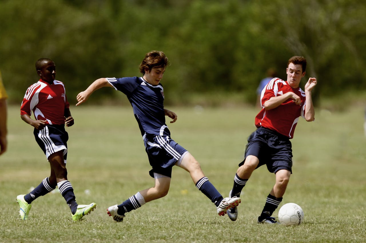 A soccer playing shooting for goal