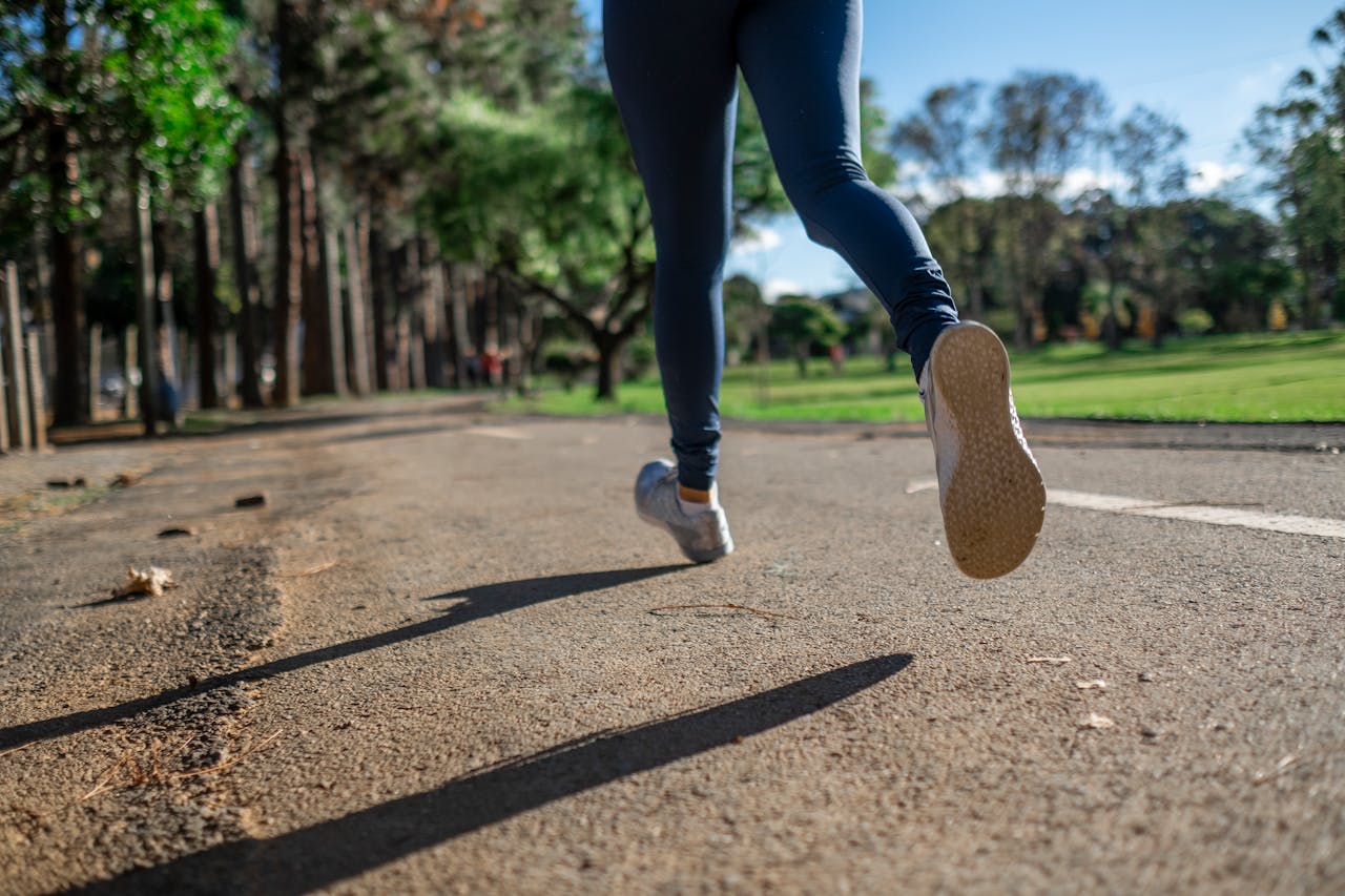 A runner on a footpath